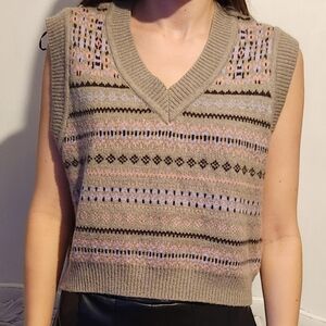 Striped Knit Vest and Black Pleated Skirt